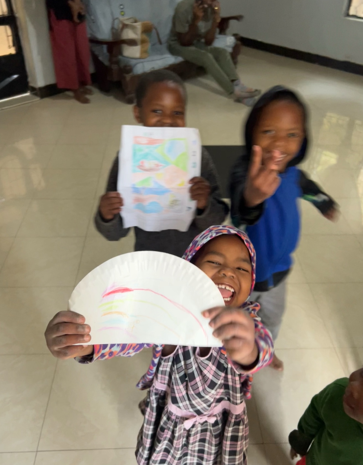 Children drawing and playing together.
